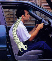 Man in car seat with very poor posture
